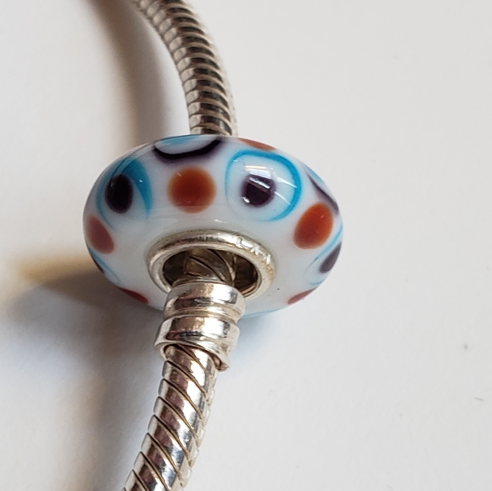 Universal unique Trollbead white blue red glass